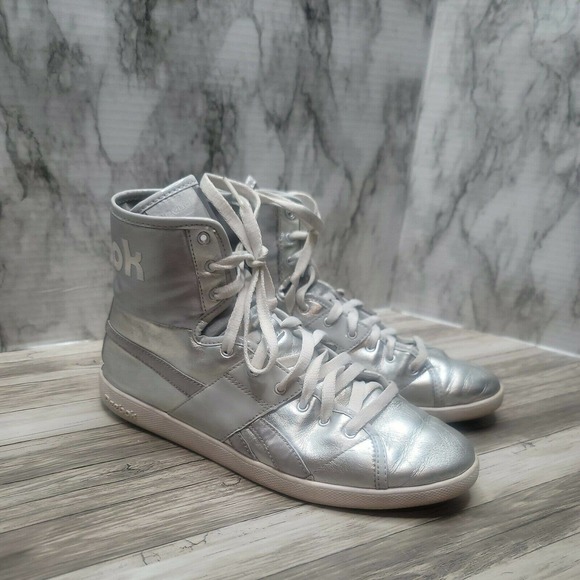 Reebok Shoes - Reebok Women’s Metallic Silver High Top Sneakers Size 10. BURNING MAN!!